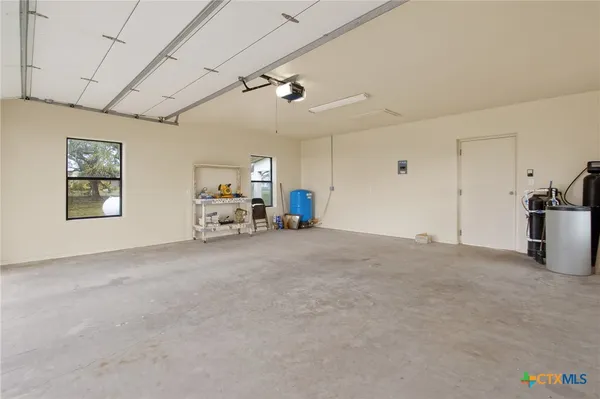 a view of a chairs in garage
