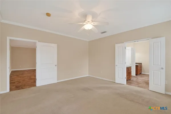 a bathroom with 2 sink and a mirror