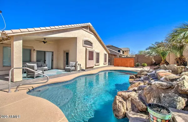 a view of a house with swimming pool