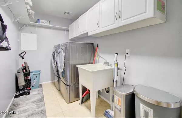 a view of a storage & utility room with racks on the wall