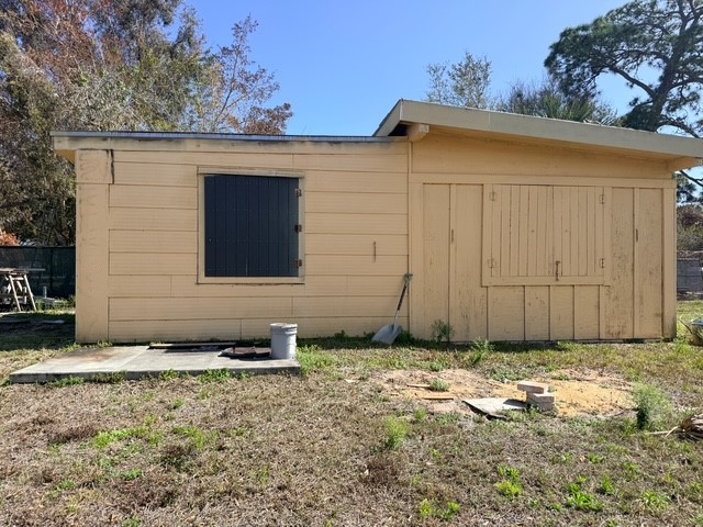 7645 129th Street Sebastian, FL 32958 - Photo 5 of 9 a view of a house with a backyard