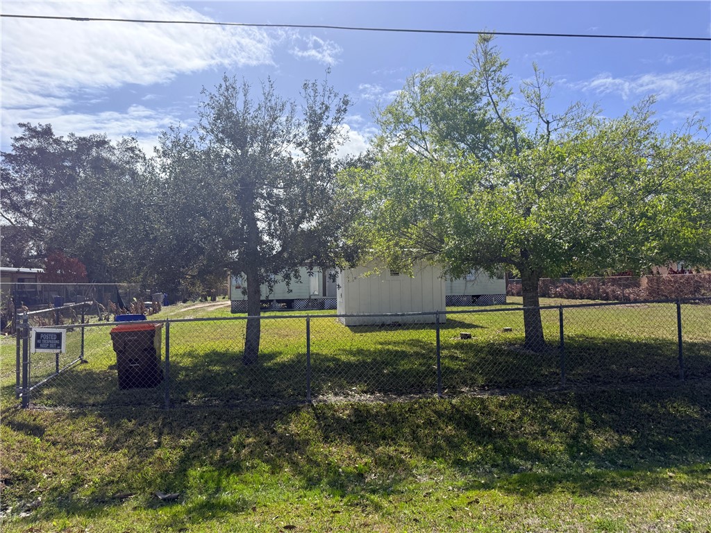 7645 129th Street Sebastian, FL 32958 - Photo 9 of 9 a view of a yard with a sitting area