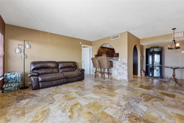 a living room with a couch and a table