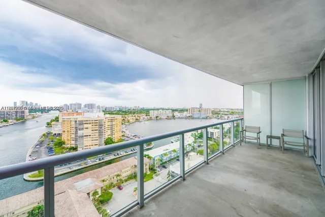 a view of swimming pool from a balcony