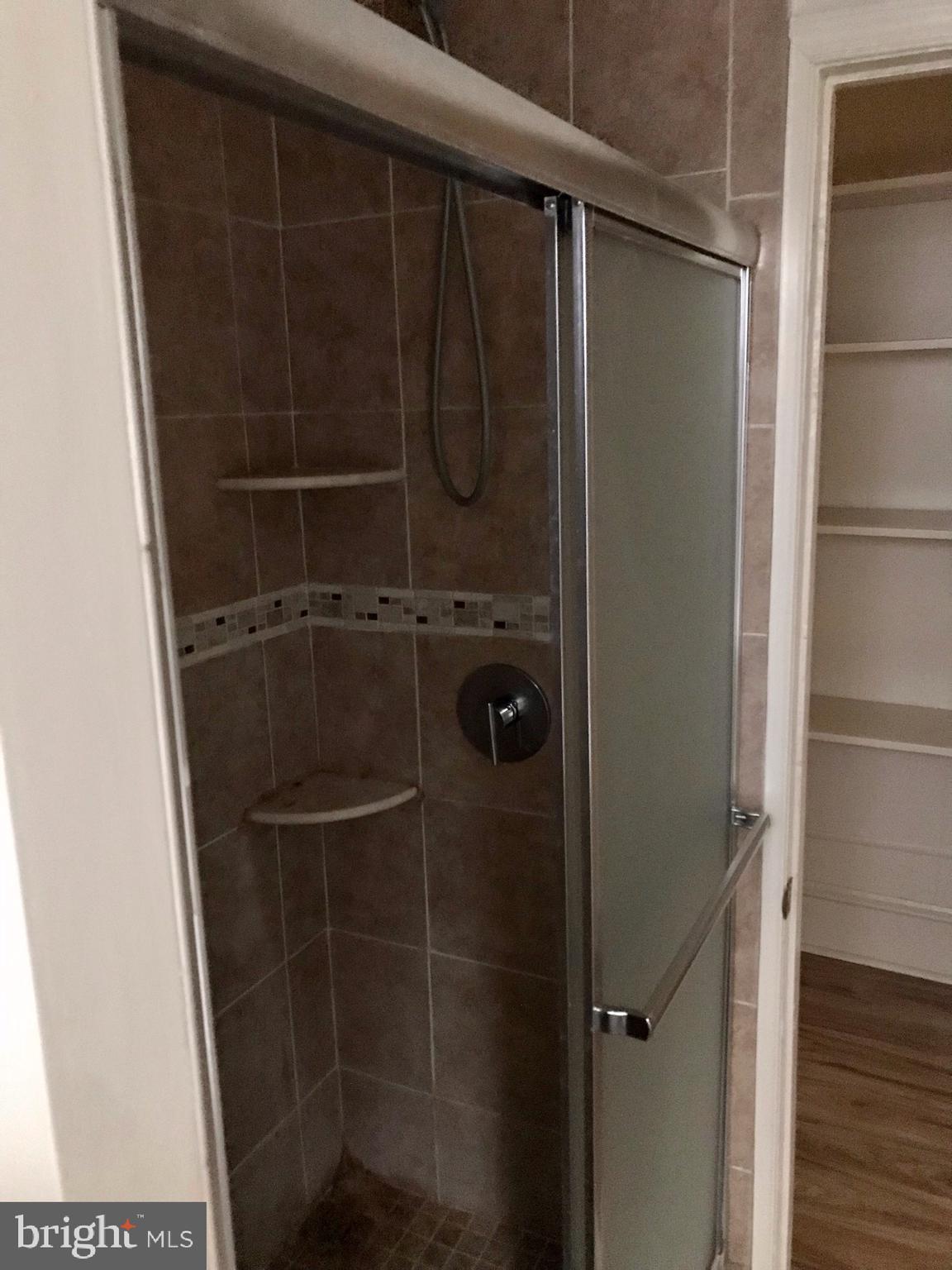 312 South 12th Street, Unit 1RR Philadelphia, PA 19107 - Photo 11 of 13 a bathroom with a shower