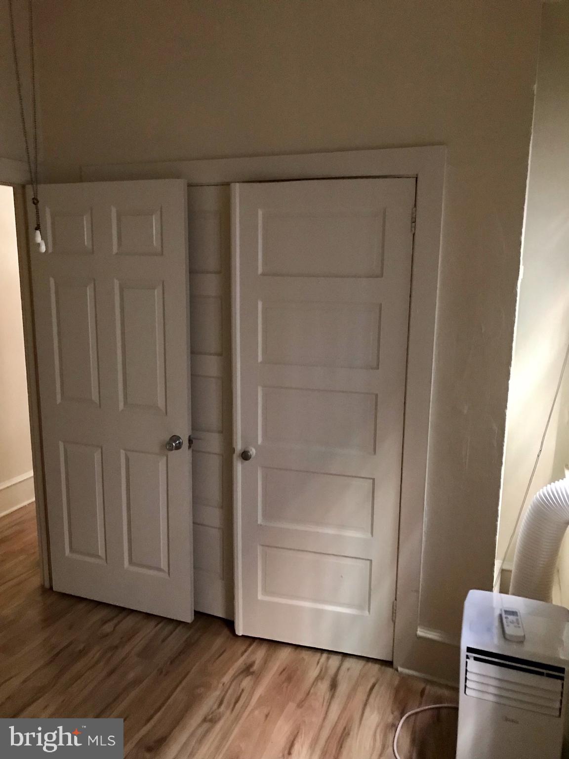 312 South 12th Street, Unit 1RR Philadelphia, PA 19107 - Photo 9 of 13 a view of empty room with wooden floor
