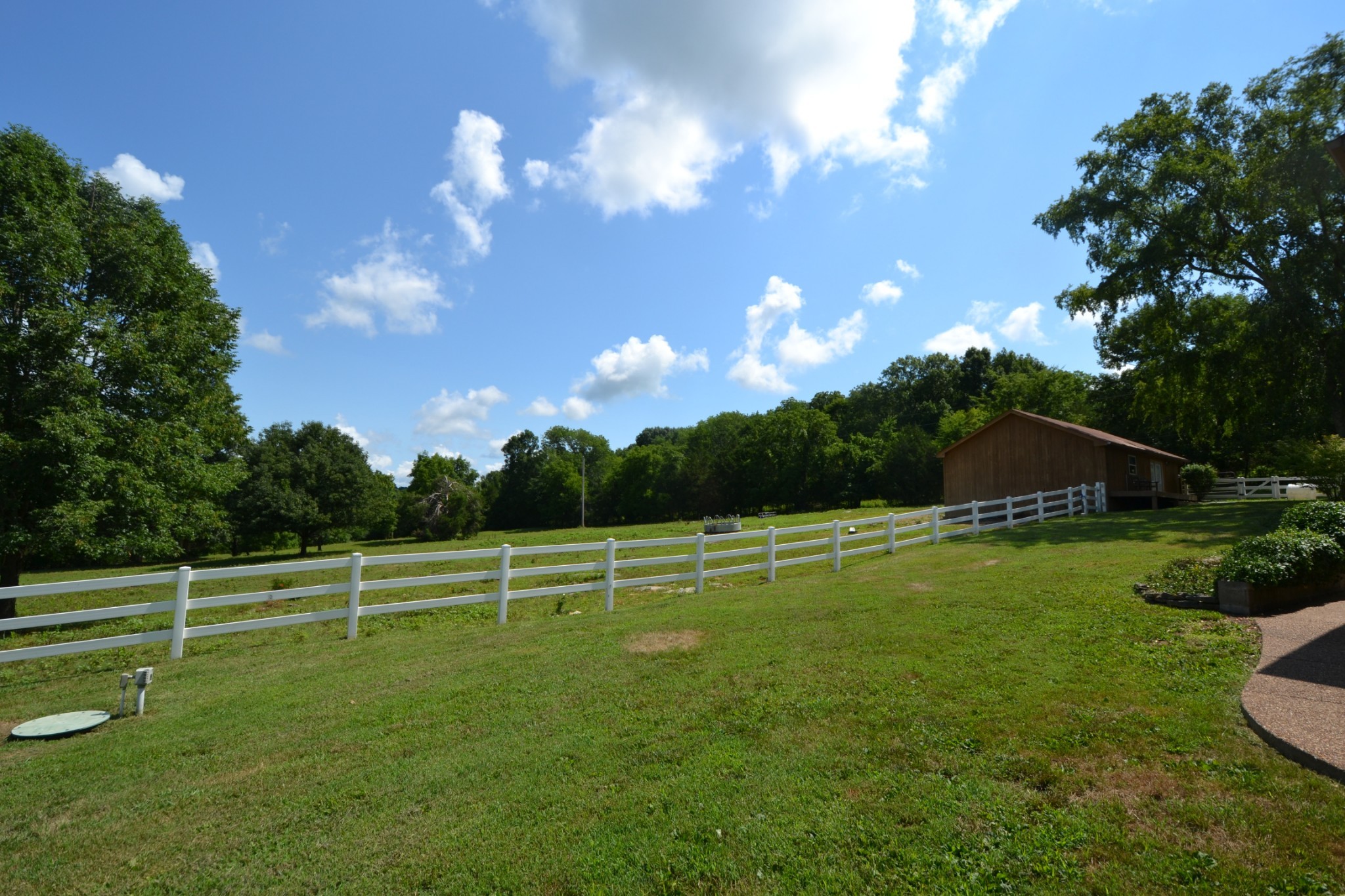 649 Lock 5 Road Lebanon, TN 37087 - Photo 16 of 65 a view of a golf course with a lake