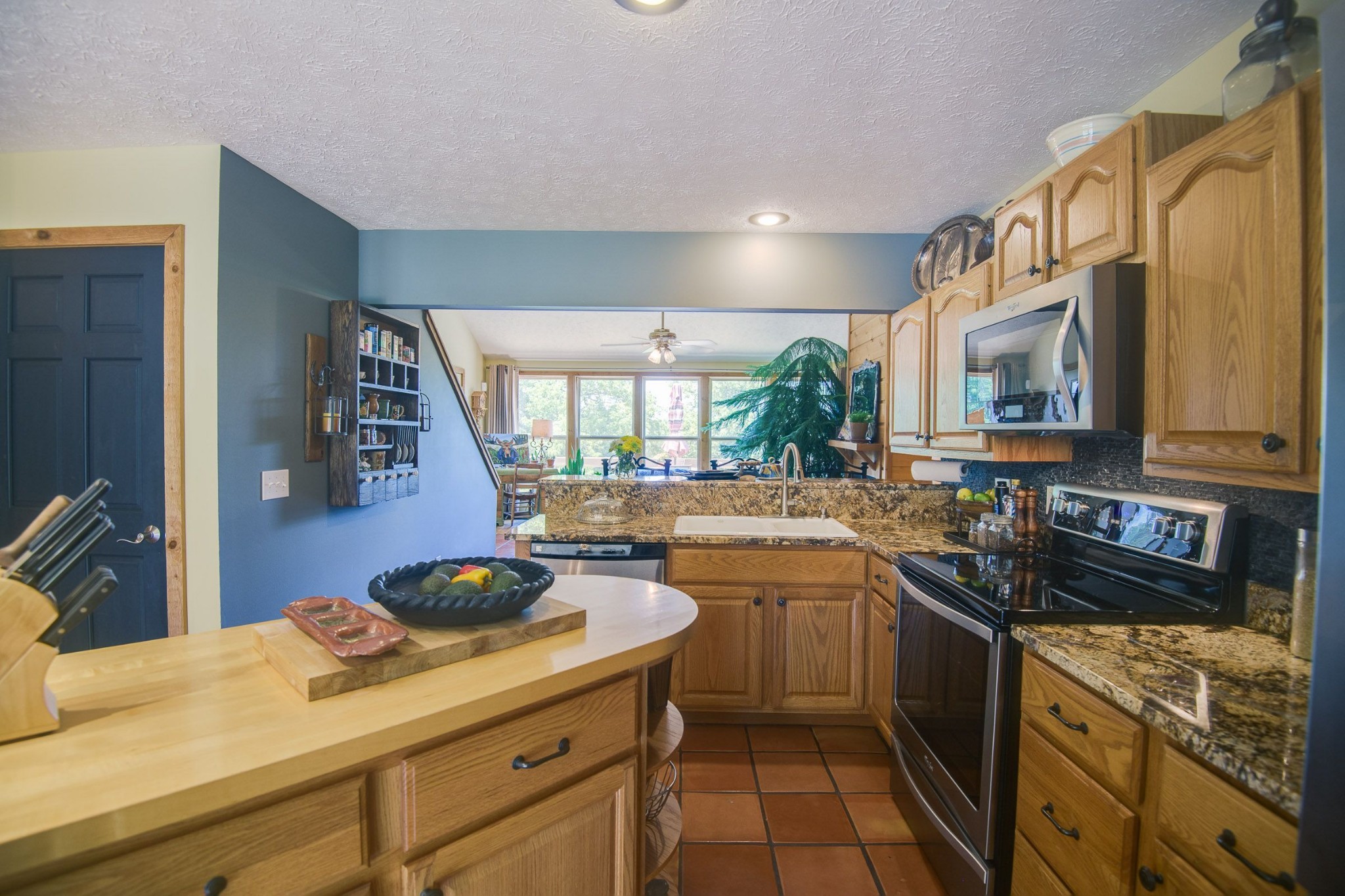 649 Lock 5 Road Lebanon, TN 37087 - Photo 25 of 65 a kitchen with stainless steel appliances granite countertop a sink stove and cabinets