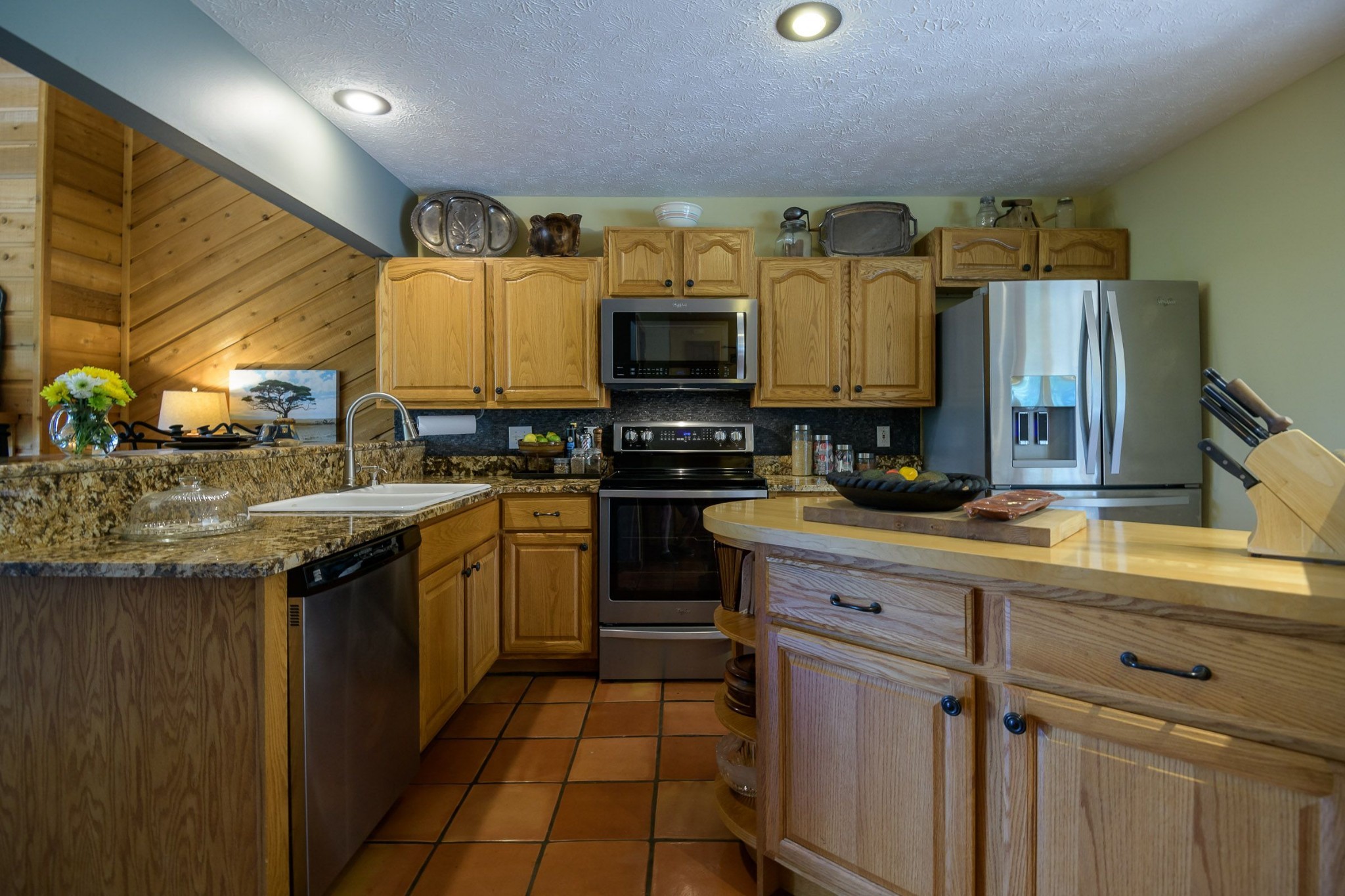 649 Lock 5 Road Lebanon, TN 37087 - Photo 26 of 65 a kitchen with granite countertop a sink stove and cabinets