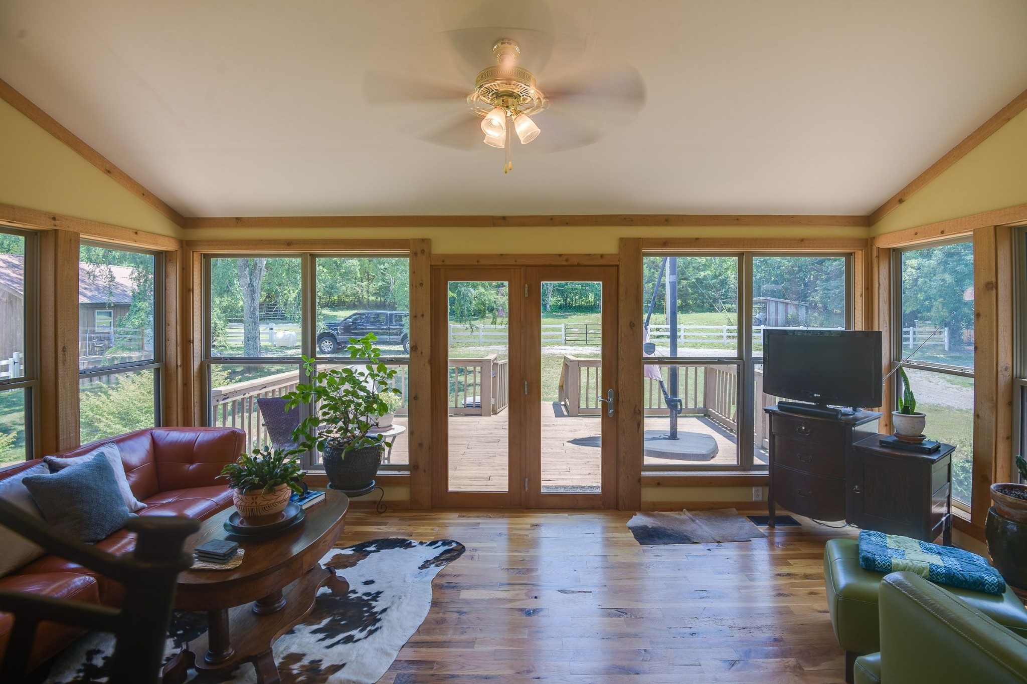 649 Lock 5 Road Lebanon, TN 37087 - Photo 28 of 65 a living room with furniture and a floor to ceiling window
