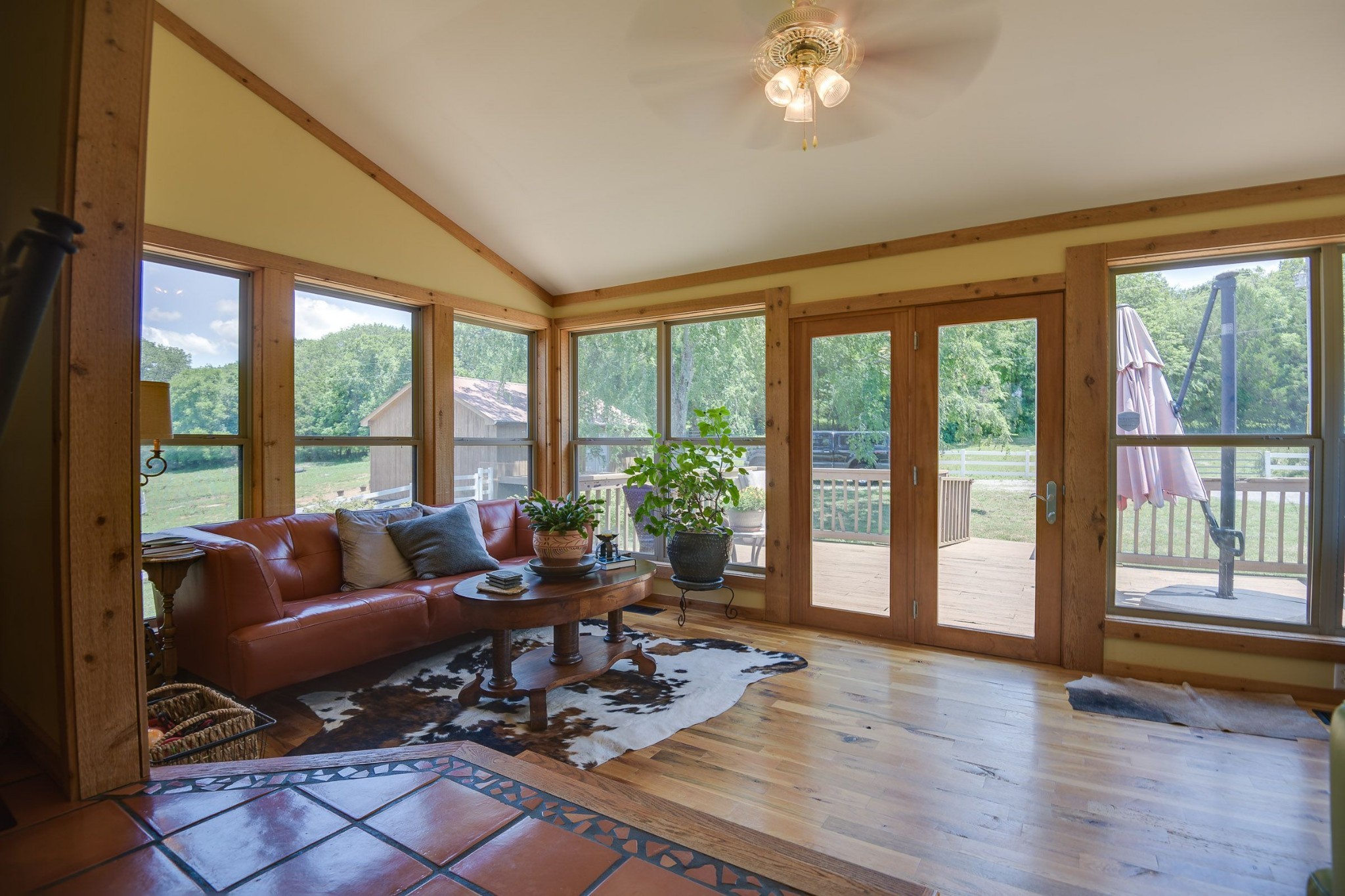 649 Lock 5 Road Lebanon, TN 37087 - Photo 30 of 65 a living room with furniture and floor to ceiling windows