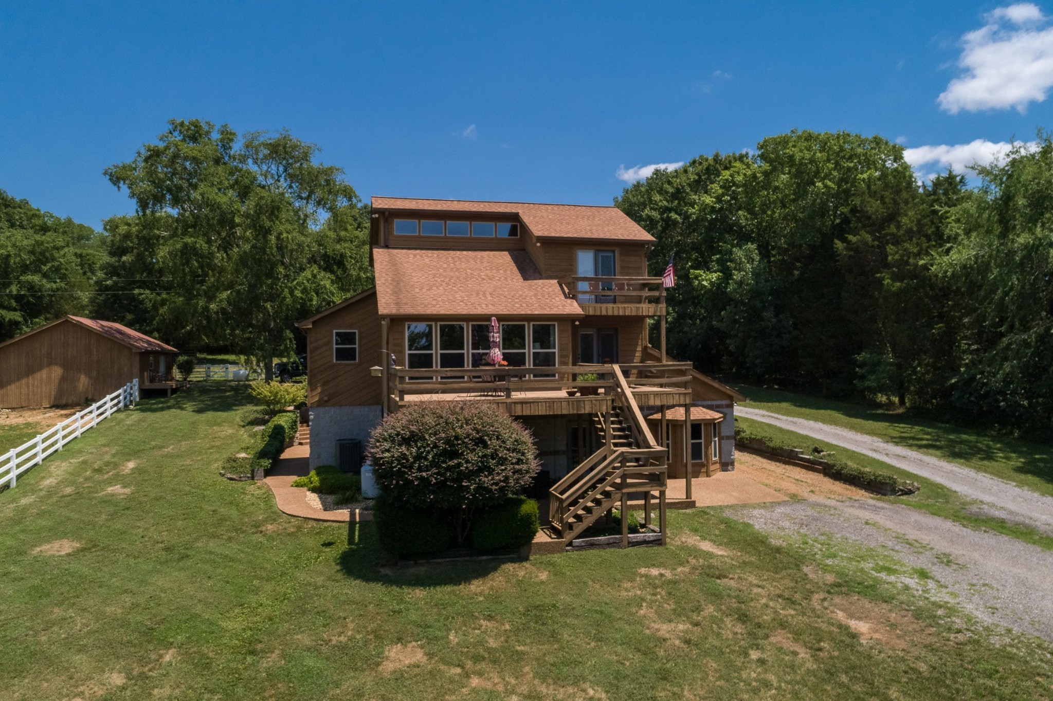 649 Lock 5 Road Lebanon, TN 37087 - Photo 3 of 65 a view of a house with backyard porch and sitting area