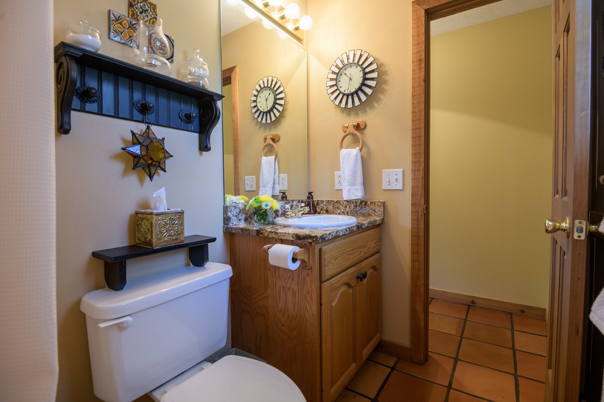 649 Lock 5 Road Lebanon, TN 37087 - Photo 33 of 65 a bathroom with a granite countertop sink a toilet and mirror