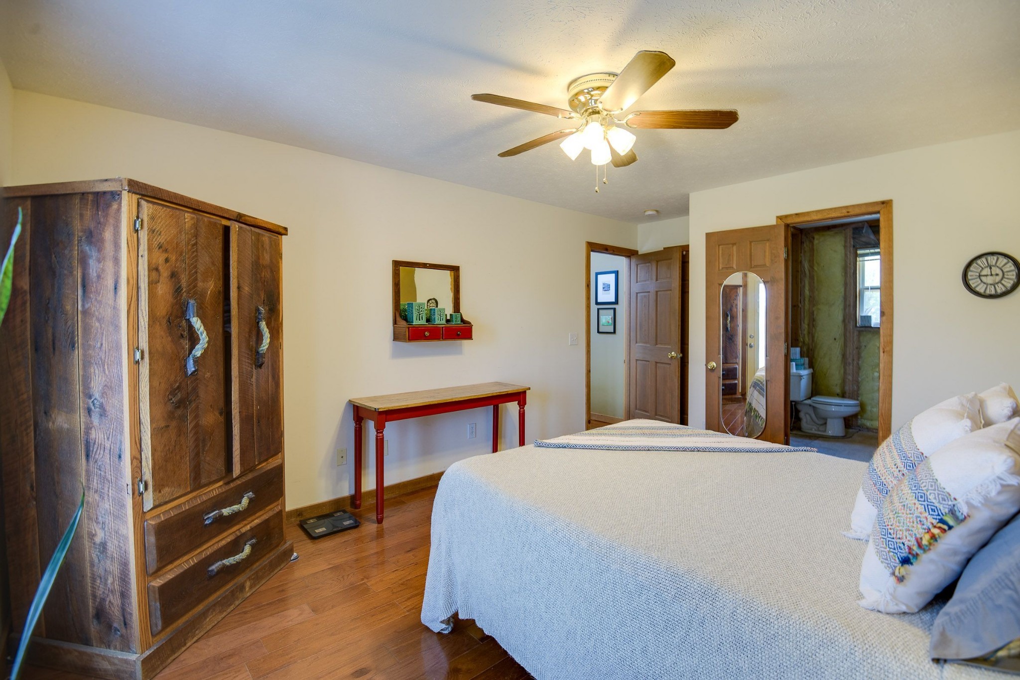 649 Lock 5 Road Lebanon, TN 37087 - Photo 39 of 65 a bedroom with a bed and a chandelier