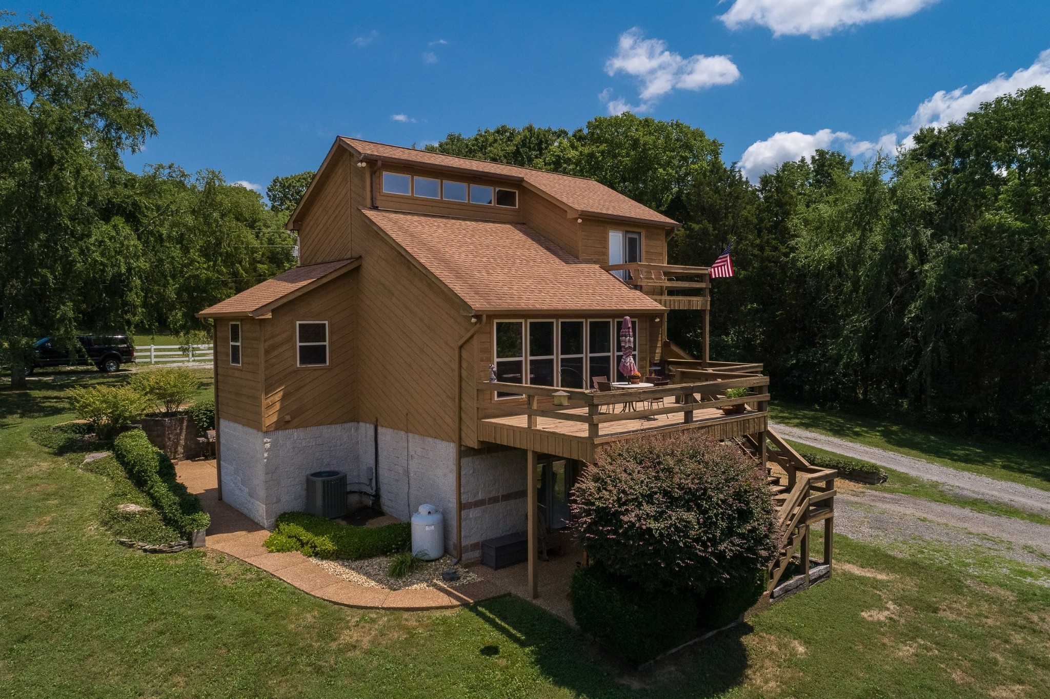 649 Lock 5 Road Lebanon, TN 37087 - Photo 4 of 65 a backyard of a house with yard fire pit barbeque oven and outdoor seating