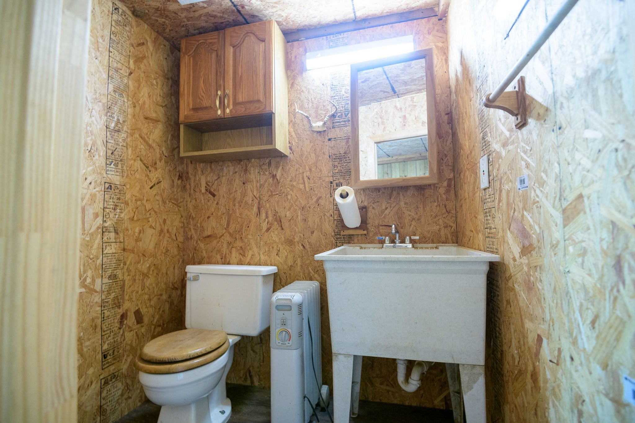 649 Lock 5 Road Lebanon, TN 37087 - Photo 56 of 65 a bathroom with a sink toilet and mirror