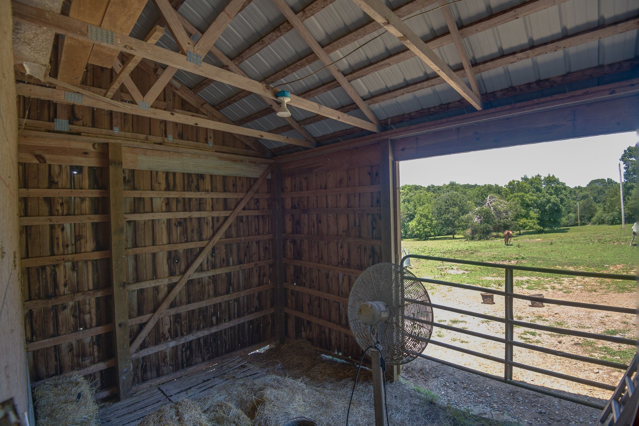 649 Lock 5 Road Lebanon, TN 37087 - Photo 57 of 65 a view of a room with sliding door and wooden floor