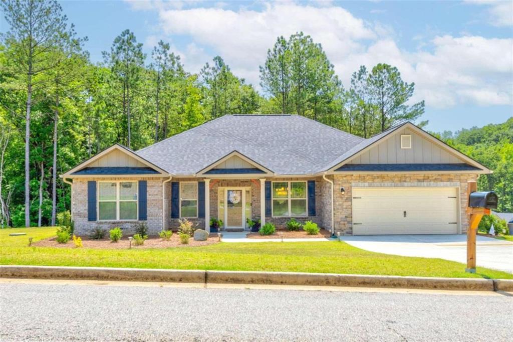 290 Bramlett Ridge Drive Dallas, GA 30157 - Photo 1 of 1 a front view of a house with a yard and trees