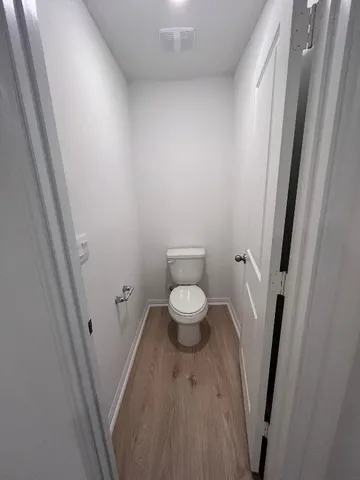 a spacious bathroom with a double vanity sink and a mirror