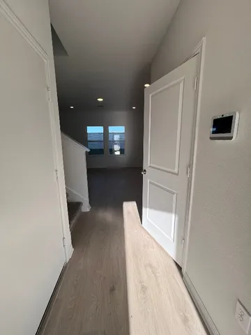 a view of entryway with livingroom