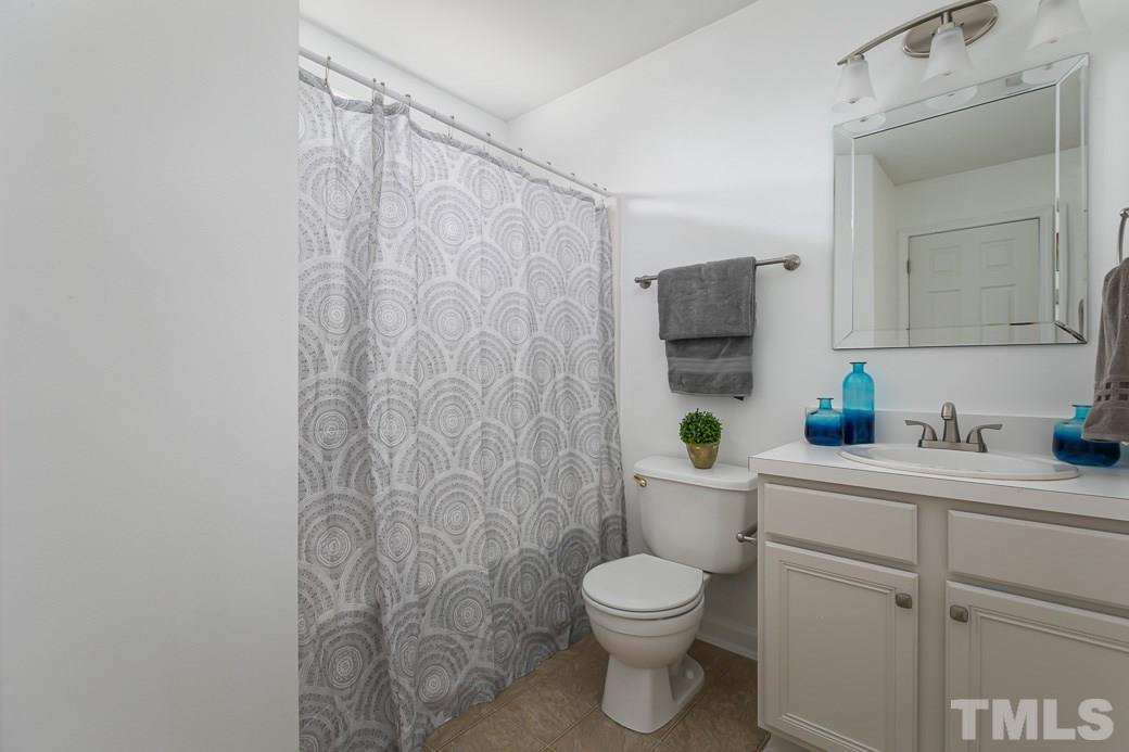 5400 Cahaba Way Raleigh, NC 27616 - Photo 9 of 13 The Guest Bath has fresh paint and NEW FIXTURES.