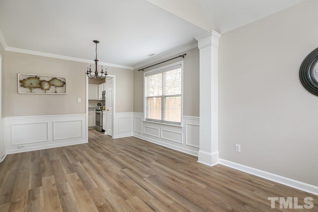 5400 Cahaba Way Raleigh, NC 27616 - Photo 2 of 13 The Dining Room is off the Kitchen and is spacious enough to fit a large table for family gatherings. There is NEW FLOORING and a DOUBLE WINDOW for gorgeous light, with direct access to the Living Room and Kitchen allowing for memorable entertaining.