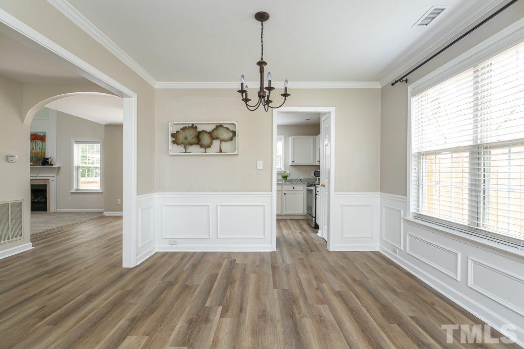 5400 Cahaba Way Raleigh, NC 27616 - Photo 13 of 13 Another view of the Dining Room showing the OPEN FLOOR PLAN and gorgeous NEW FLOORING.