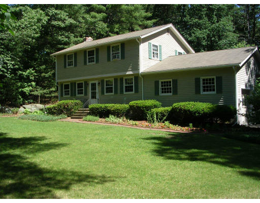 55 Box Mill Road Boxborough, MA 01719 - Photo 1 of 16 a front view of a house with a yard