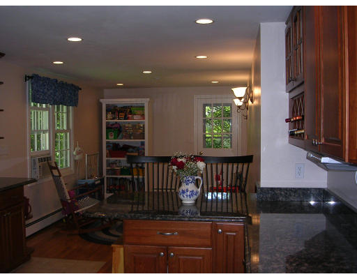 55 Box Mill Road Boxborough, MA 01719 - Photo 11 of 16 a view of entryway livingroom and hall with wooden floor