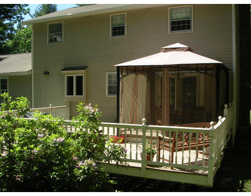 55 Box Mill Road Boxborough, MA 01719 - Photo 2 of 16 a front view of a house with yard