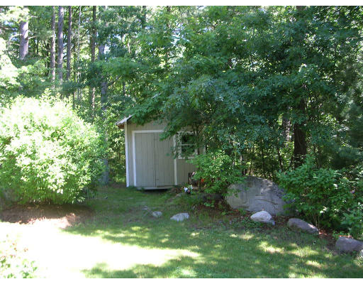 55 Box Mill Road Boxborough, MA 01719 - Photo 4 of 16 a backyard of a house with lots of green space