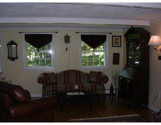 55 Box Mill Road Boxborough, MA 01719 - Photo 6 of 16 a living room with furniture and a large window
