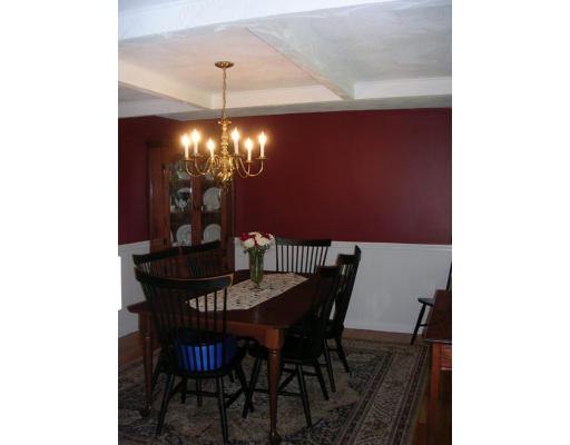 55 Box Mill Road Boxborough, MA 01719 - Photo 7 of 16 a view of a dining room with furniture and chandelier