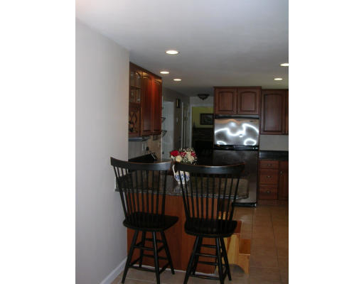55 Box Mill Road Boxborough, MA 01719 - Photo 10 of 16 a view of a dining room with furniture