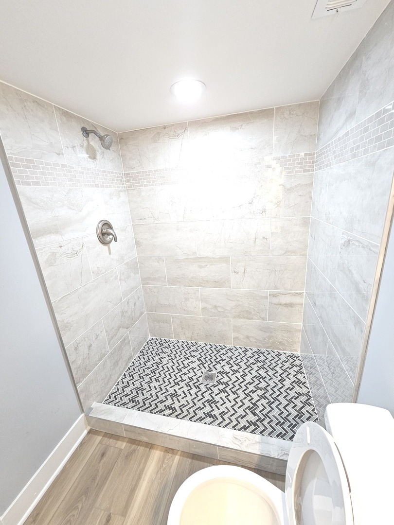 14926 Kenton Avenue Midlothian, IL 60445 - Photo 20 of 20 a bathroom with a sink and a shower