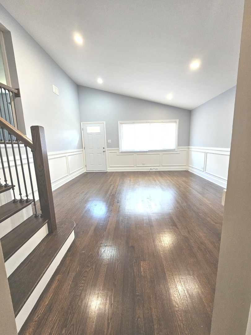 14926 Kenton Avenue Midlothian, IL 60445 - Photo 5 of 20 a view of empty room with wooden floor