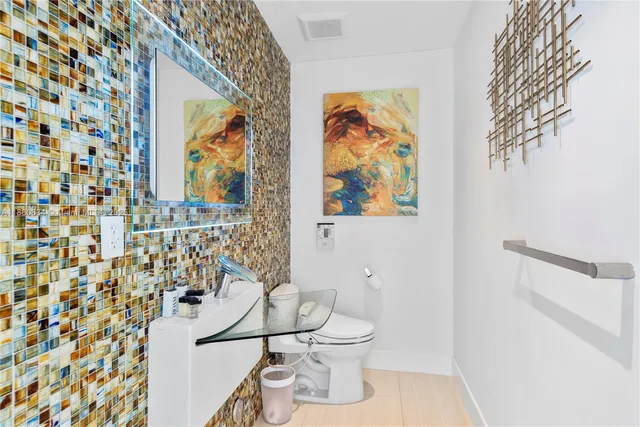 a view of balcony with furniture