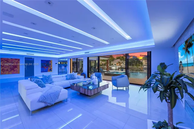 a view of entryway with paintings on the wall