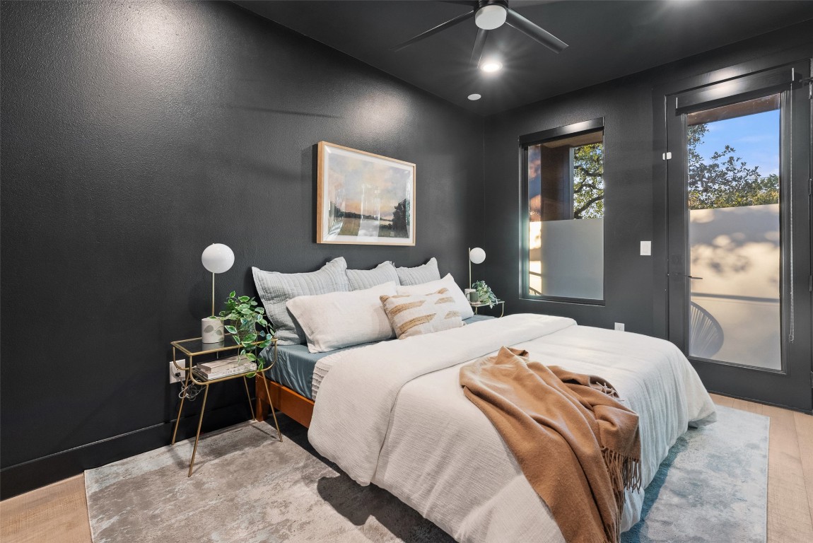 2209 Rae Dell Avenue Austin, TX 78704 - Photo 15 of 33 a bedroom with bed and window