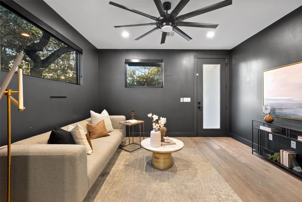 2209 Rae Dell Avenue Austin, TX 78704 - Photo 9 of 33 Living room with light wood-style flooring, ceiling fan, and recessed lighting