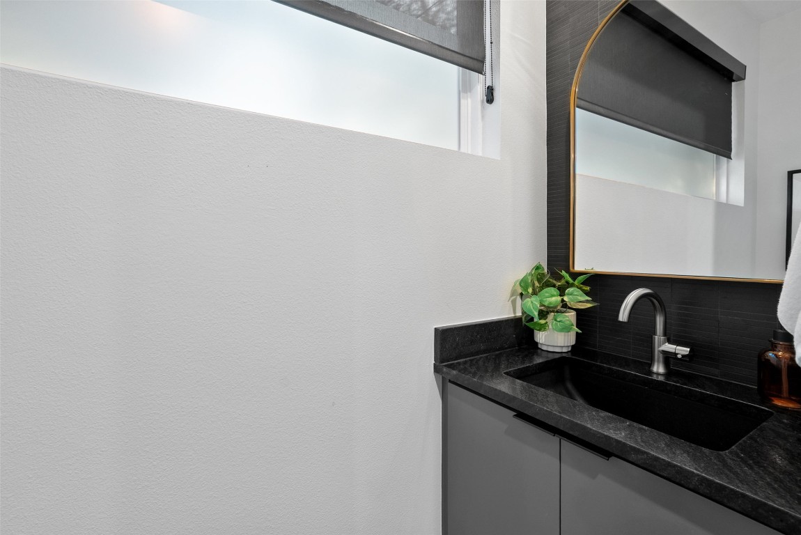 2209 Rae Dell Avenue Austin, TX 78704 - Photo 10 of 33 a close view of sink and mirror