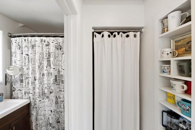 a couple of potted plants in front of door