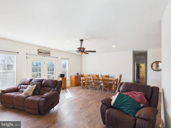 a view of room with window and wooden floor