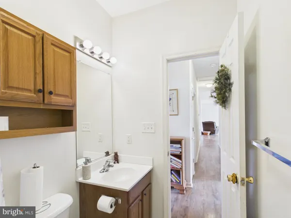 a bedroom with a bed and a cabinets
