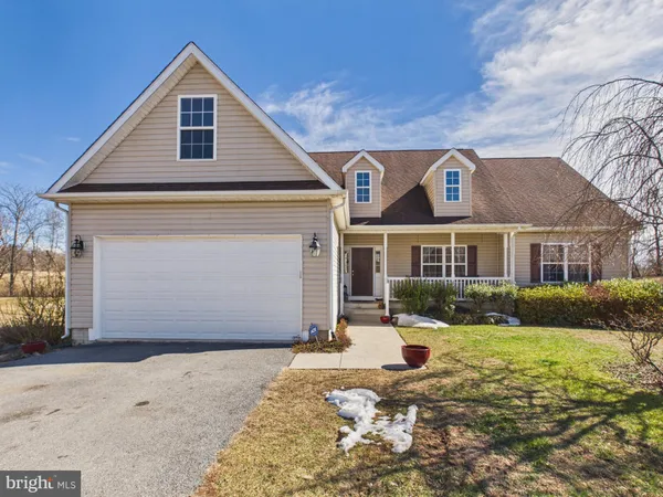 a front view of house with yard