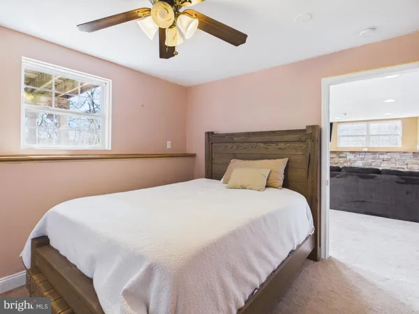 a kitchen with stainless steel appliances a sink stove and cabinets