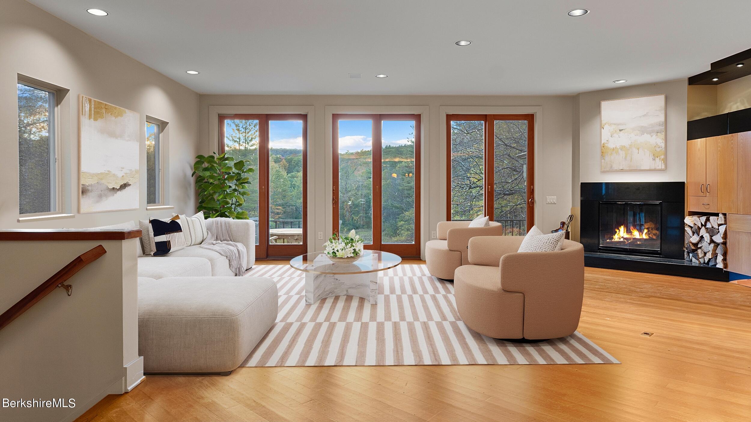 297 E Road Alford, MA 01266 - Photo 11 of 45 a living room with furniture fireplace and a large window