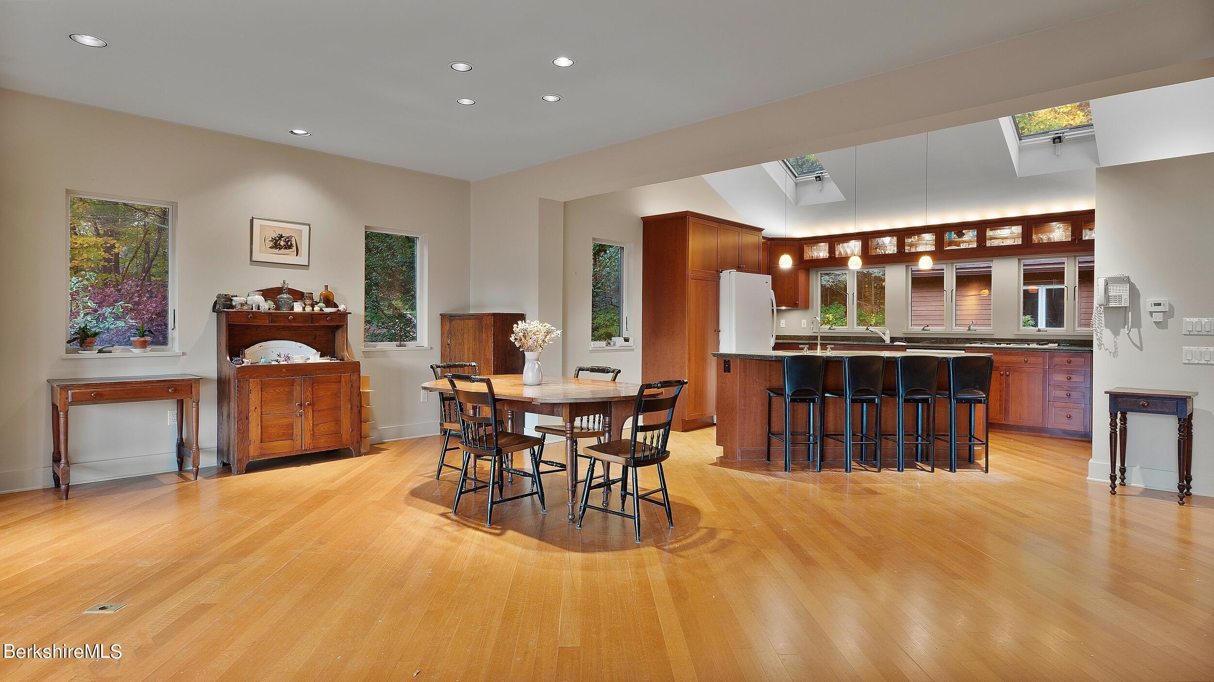 297 E Road Alford, MA 01266 - Photo 15 of 45 a view of a dining room with furniture and chandelier