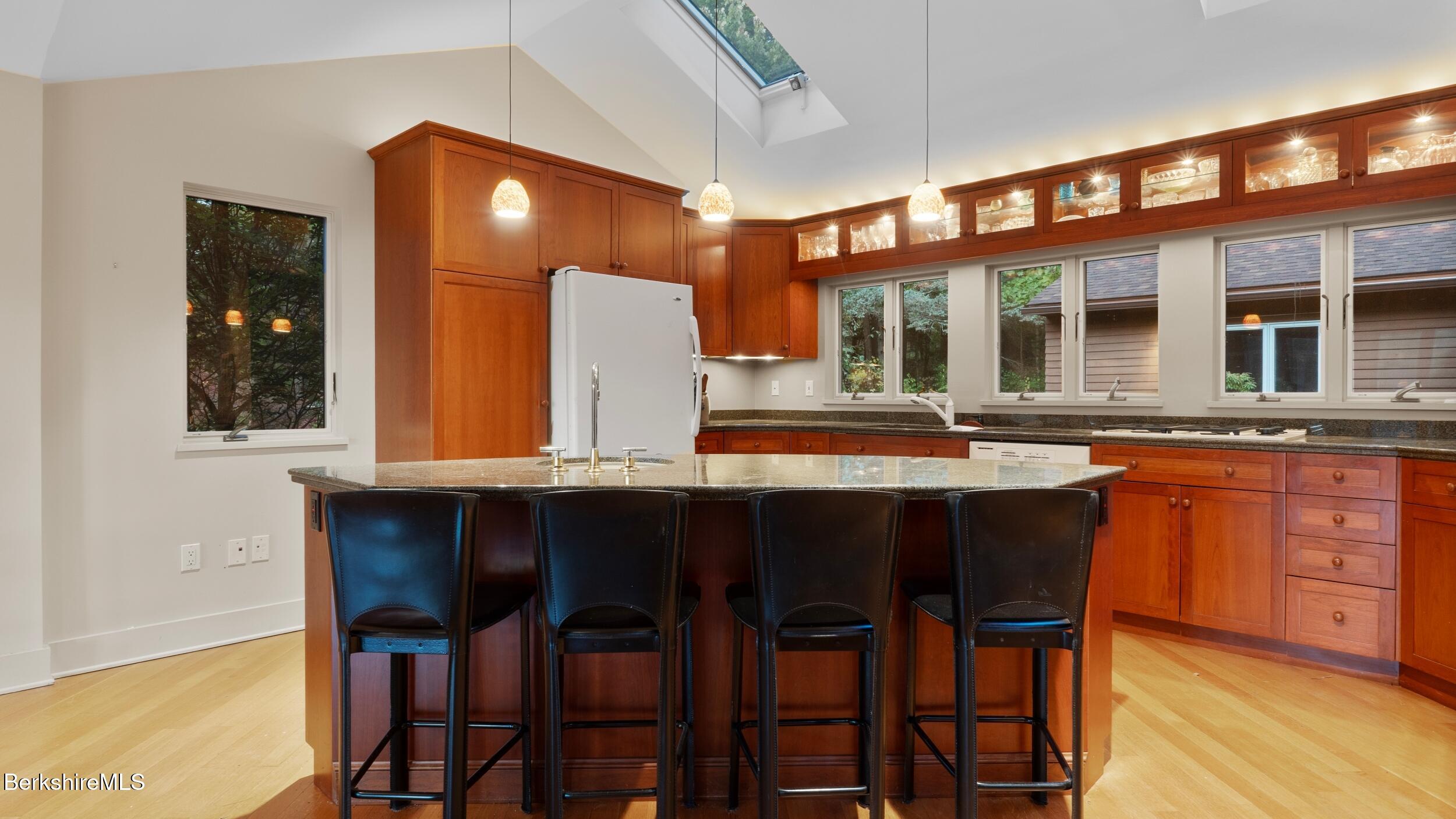 297 E Road Alford, MA 01266 - Photo 16 of 45 a kitchen with a table and chairs in it