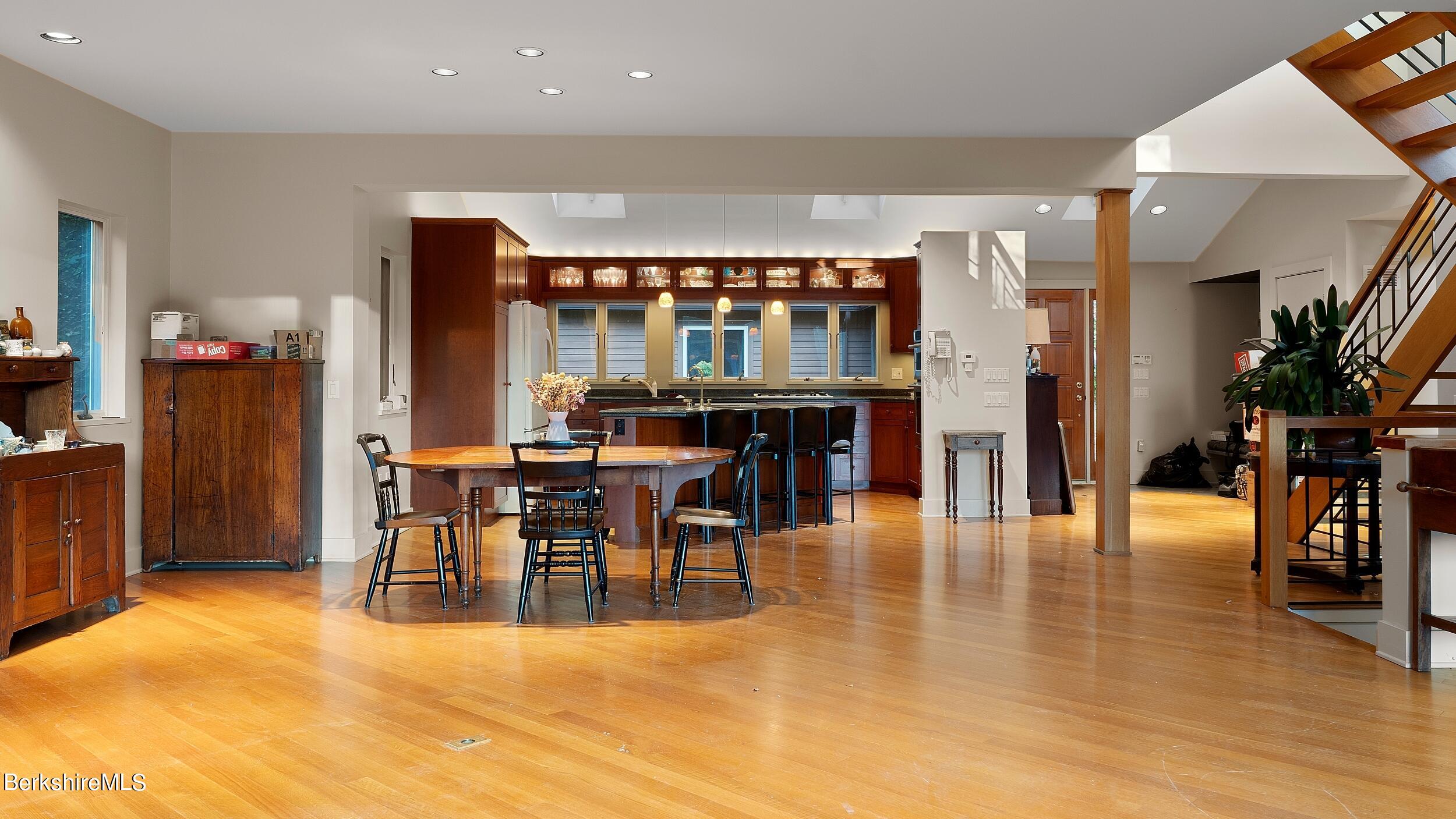297 E Road Alford, MA 01266 - Photo 17 of 45 a view of a dining room with furniture and chandelier